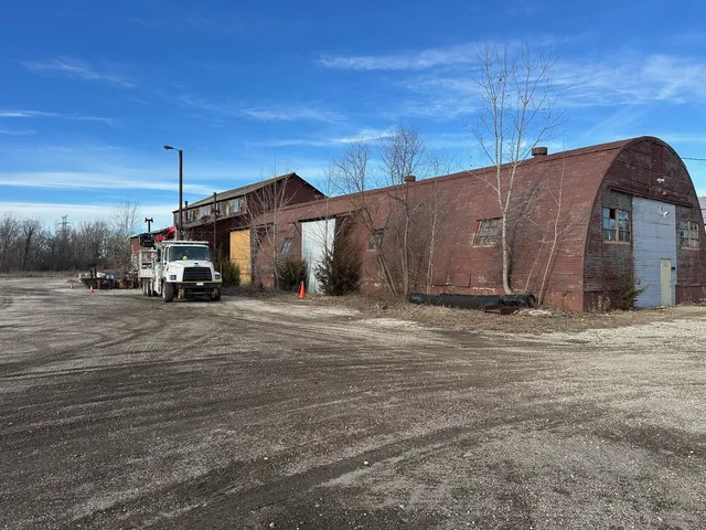 a view of a backyard of the house