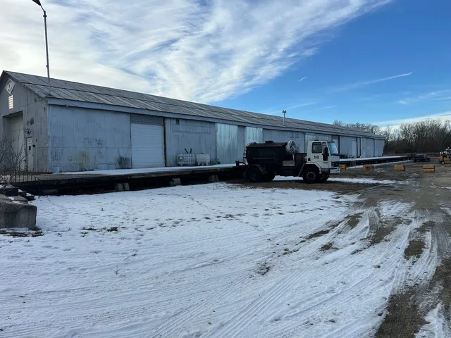 a view of a truck parked in a yard