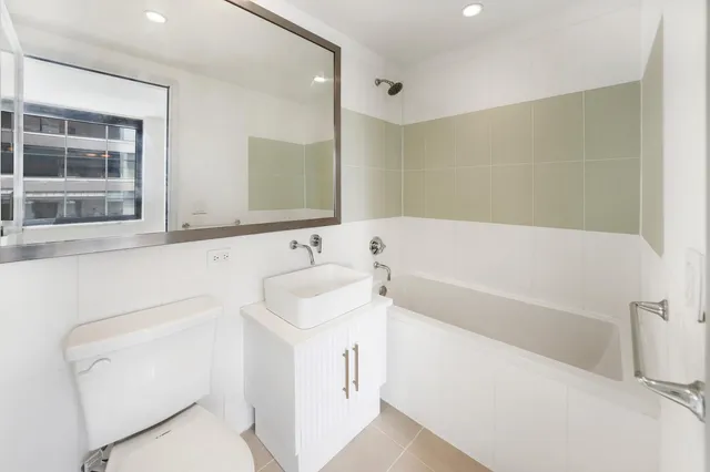 a bathroom with a sink and a bathtub