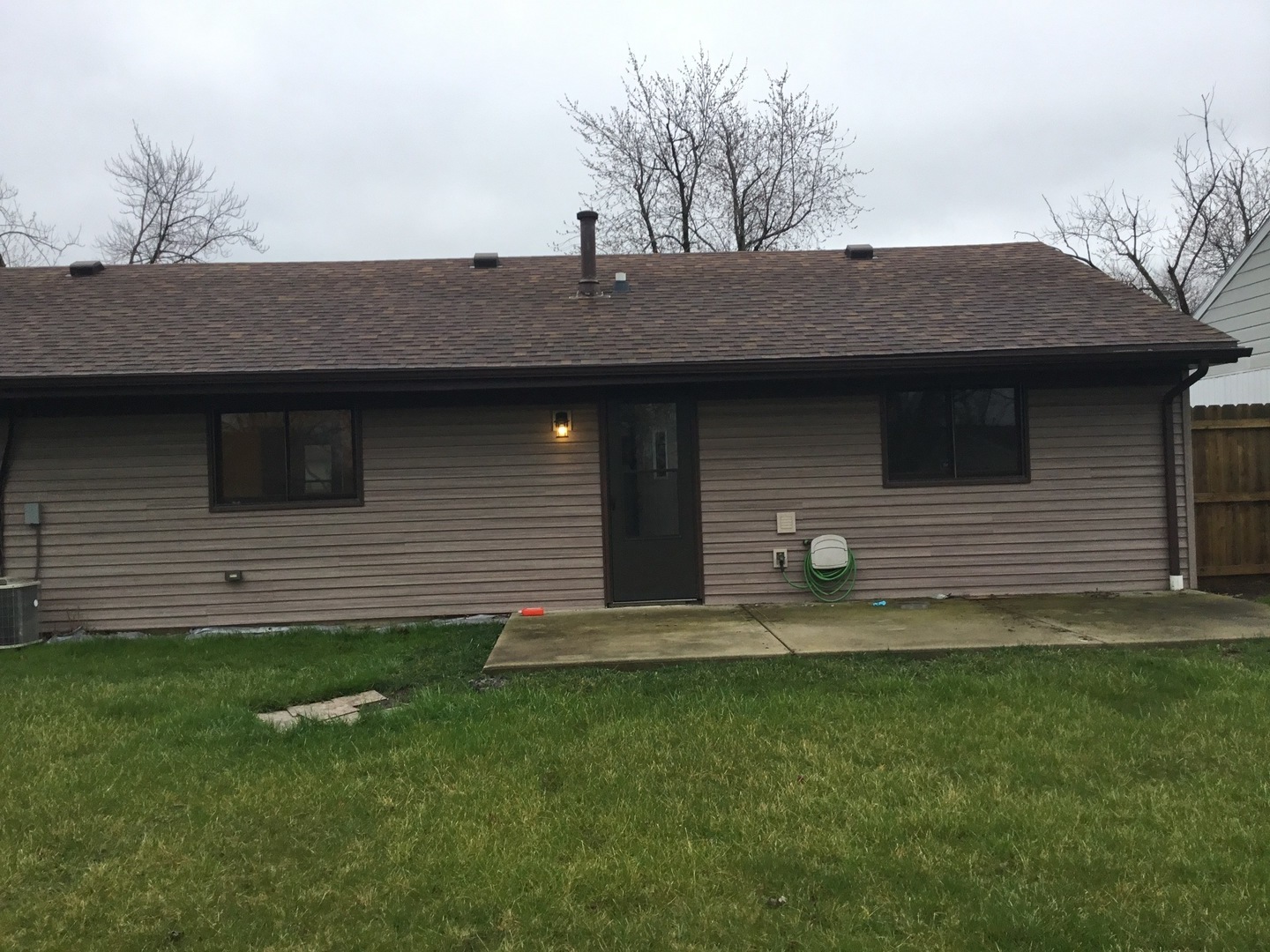 Undisclosed Address Richton Park, IL 60471 - Photo 10 of 11 a backyard of a house with lots of green space