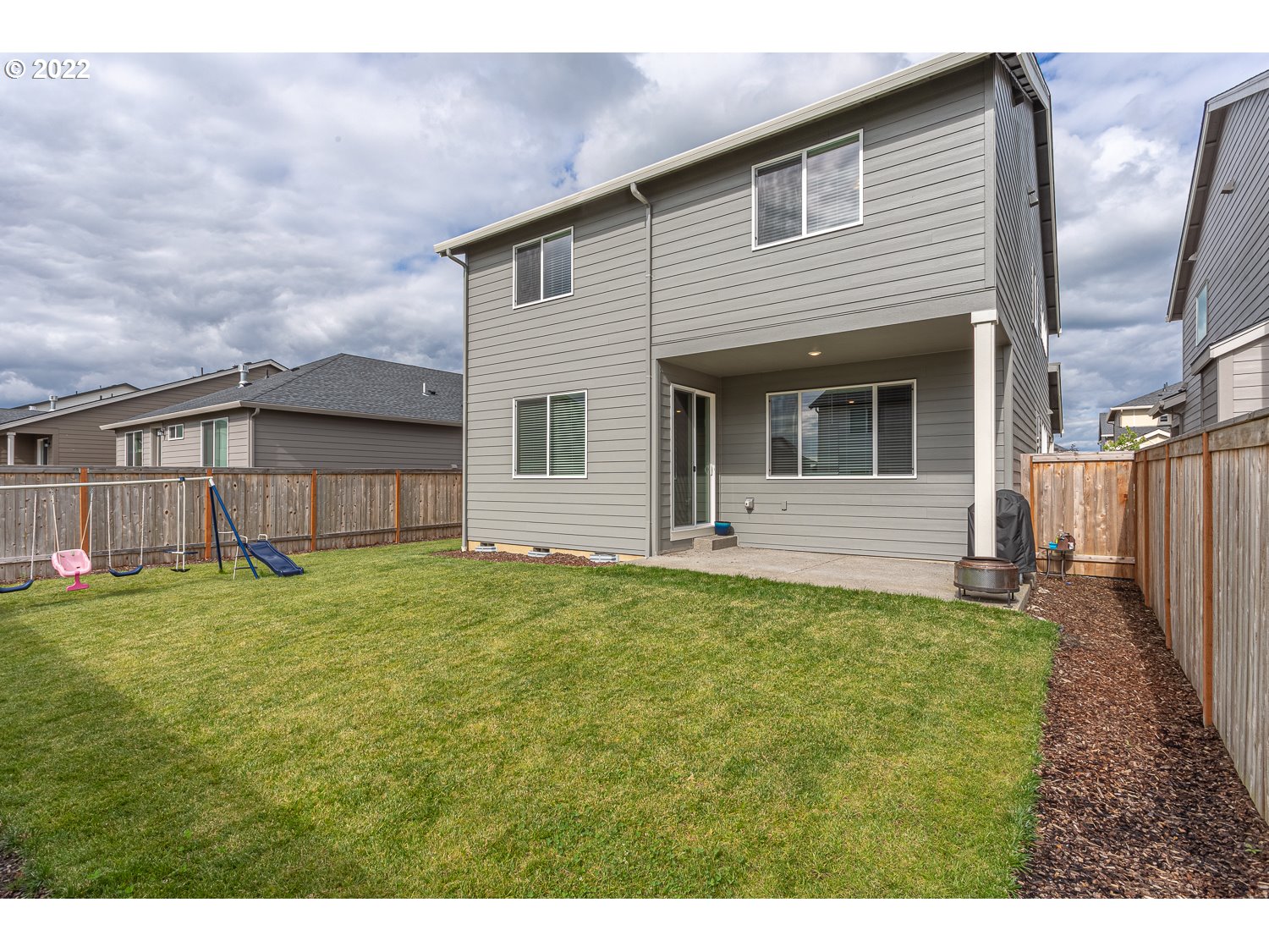3821 South 41st Place Ridgefield, WA 98642 - Photo 17 of 32 a view of a house with backyard and garden