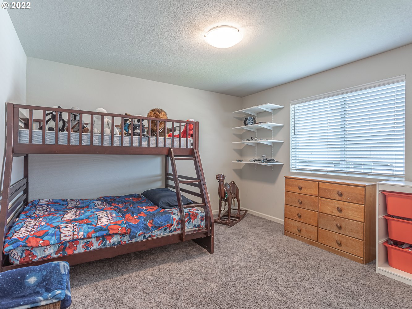 3821 South 41st Place Ridgefield, WA 98642 - Photo 31 of 32 a bedroom with a bed and a window