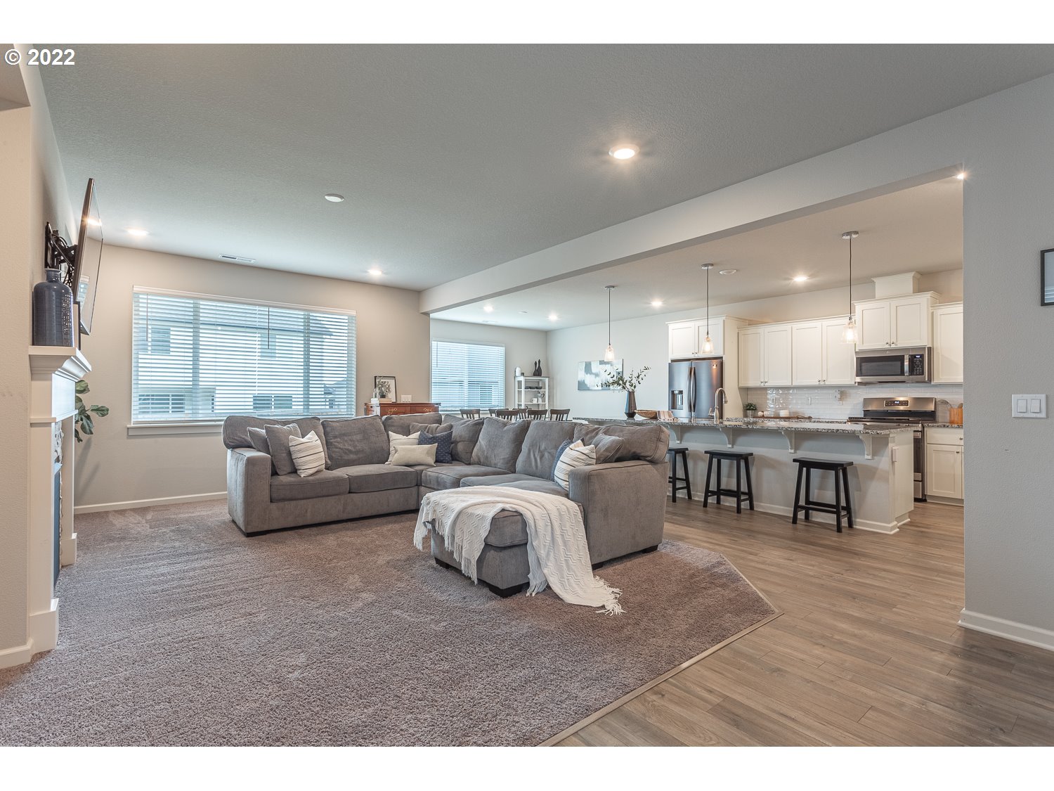 3821 South 41st Place Ridgefield, WA 98642 - Photo 4 of 32 a living room with furniture and a table