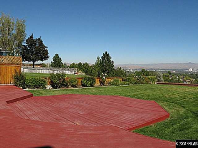 2332 Silver Ridge Drive Reno, NV 89509 - Photo 3 of 9 a view of a golf course with a lake