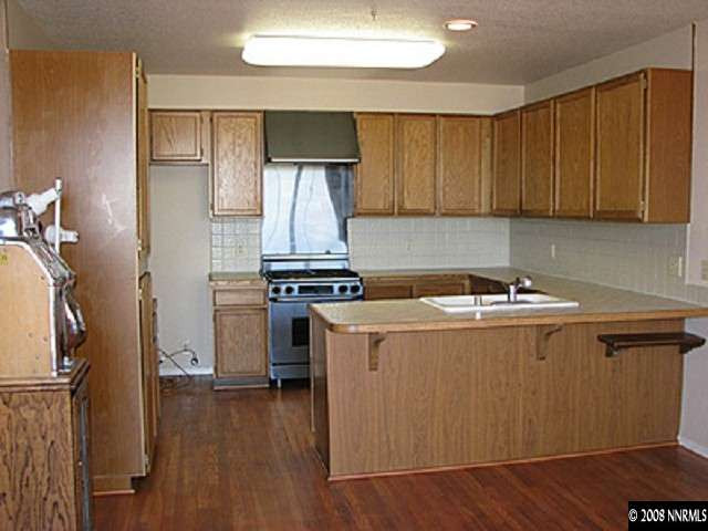 2332 Silver Ridge Drive Reno, NV 89509 - Photo 7 of 9 a utility room with washer and dryer
