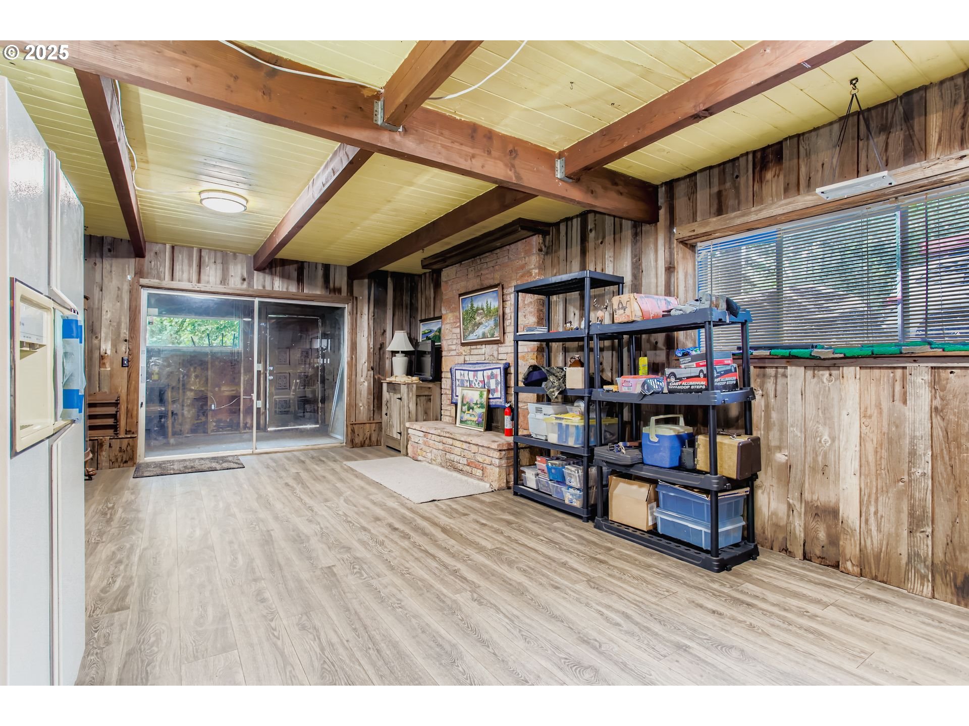 4201 Southwest Childs Road Lake Oswego, OR 97034 - Photo 15 of 37 a room with wooden floor and furniture