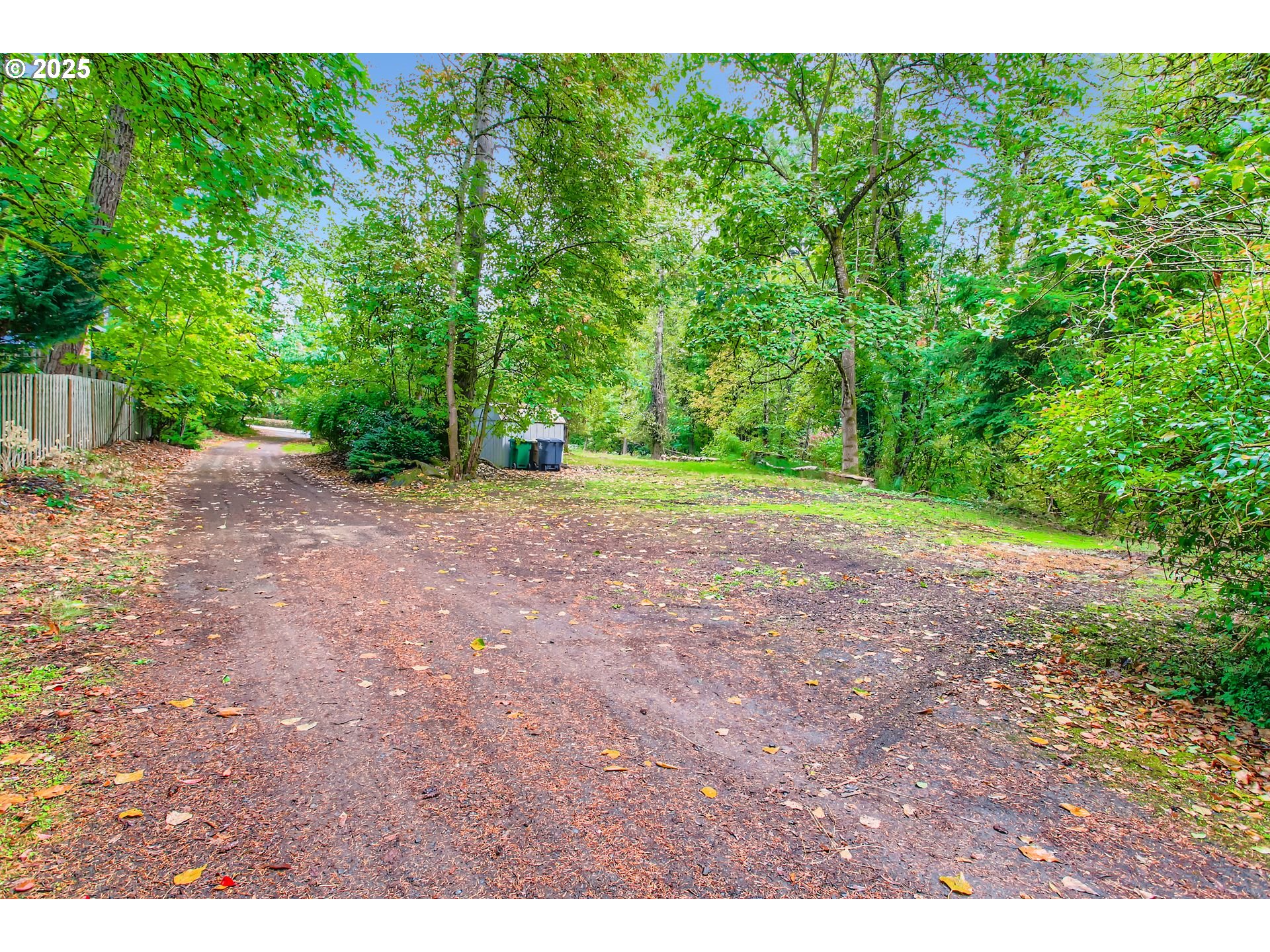4201 Southwest Childs Road Lake Oswego, OR 97034 - Photo 24 of 37 a view of a yard with large trees
