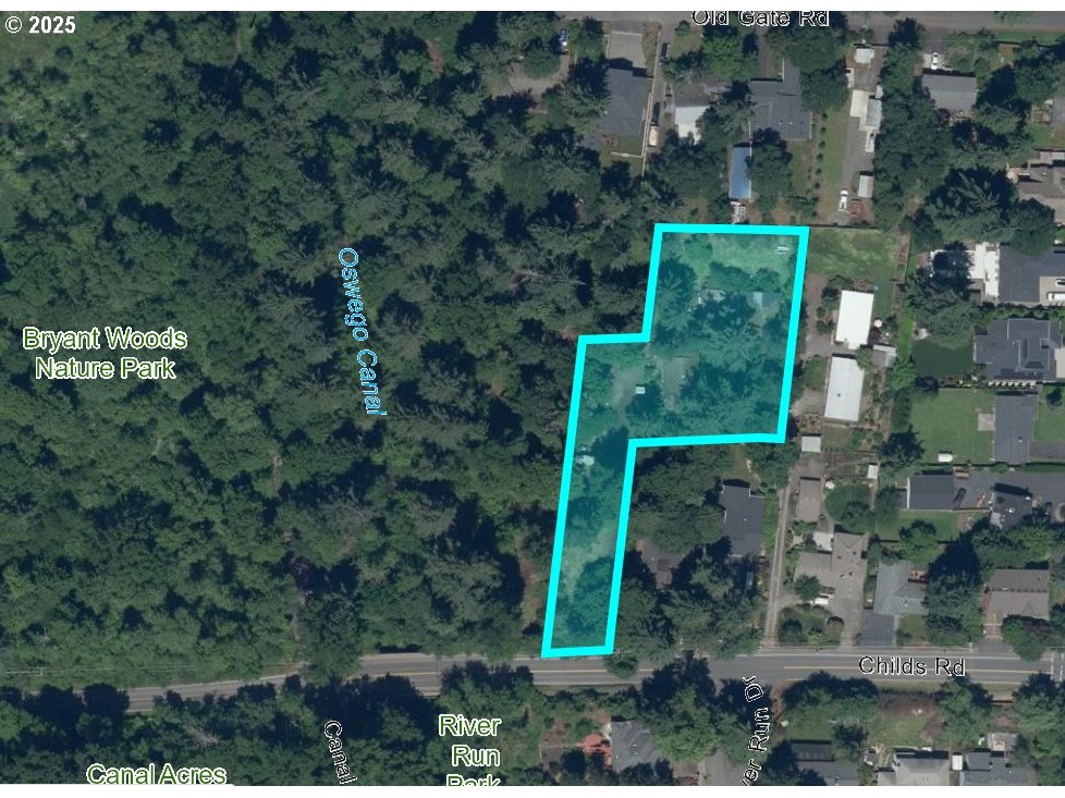 4201 Southwest Childs Road Lake Oswego, OR 97034 - Photo 30 of 37 a view of a house with a backyard