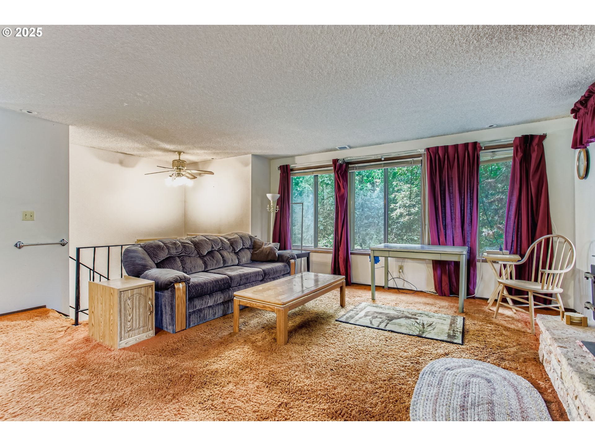 4201 Southwest Childs Road Lake Oswego, OR 97034 - Photo 5 of 37 a living room with furniture window and flat screen tv