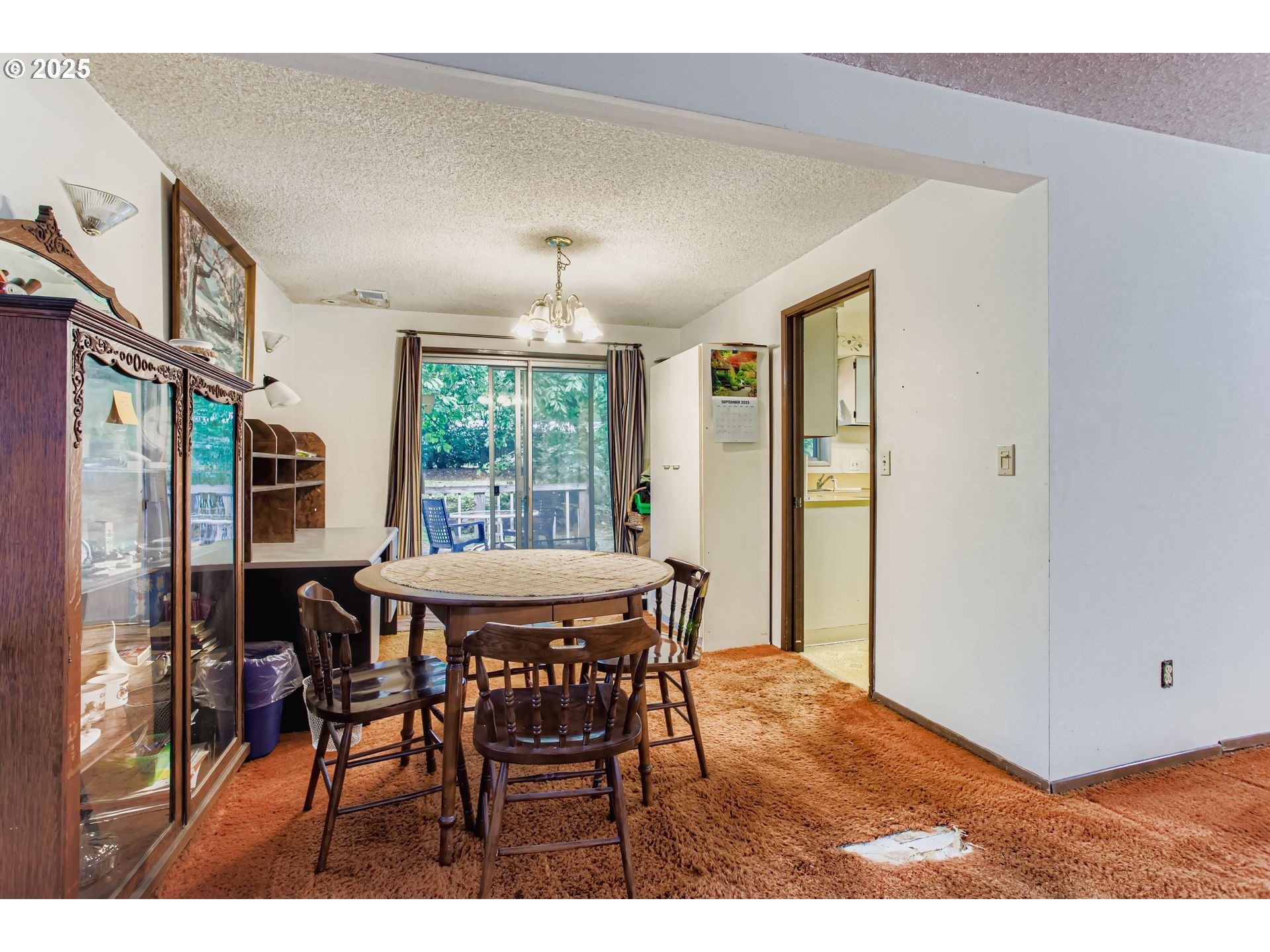 4201 Southwest Childs Road Lake Oswego, OR 97034 - Photo 6 of 37 a view of a dining room with furniture window and outside view
