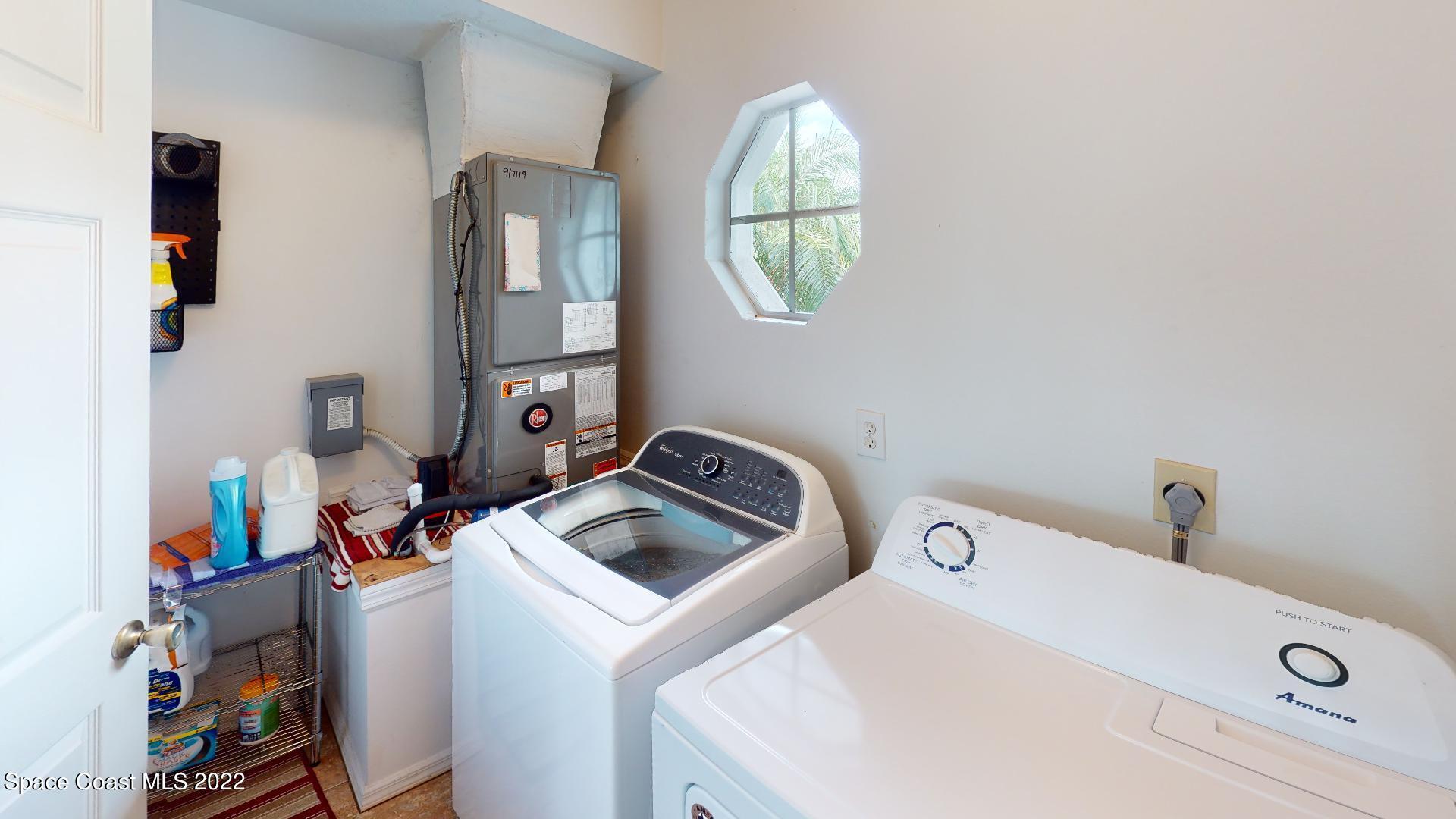 6801 Cecil Road Cocoa, FL 32927 - Photo 28 of 66 a utility room with dryer and washer
