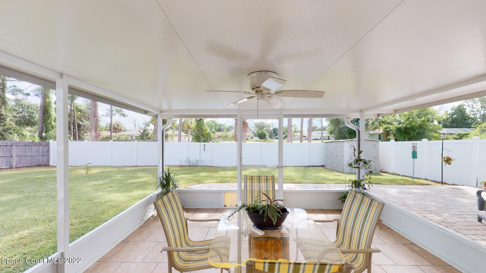 6801 Cecil Road Cocoa, FL 32927 - Photo 49 of 66 a view of a dining room with furniture window and outside view