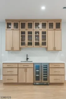a kitchen with a stove and cabinets