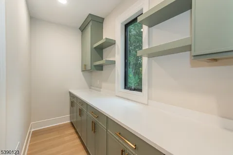 a kitchen with a sink and a window