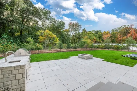 a view of a park with large trees