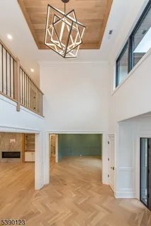 a view of a hallway with a room