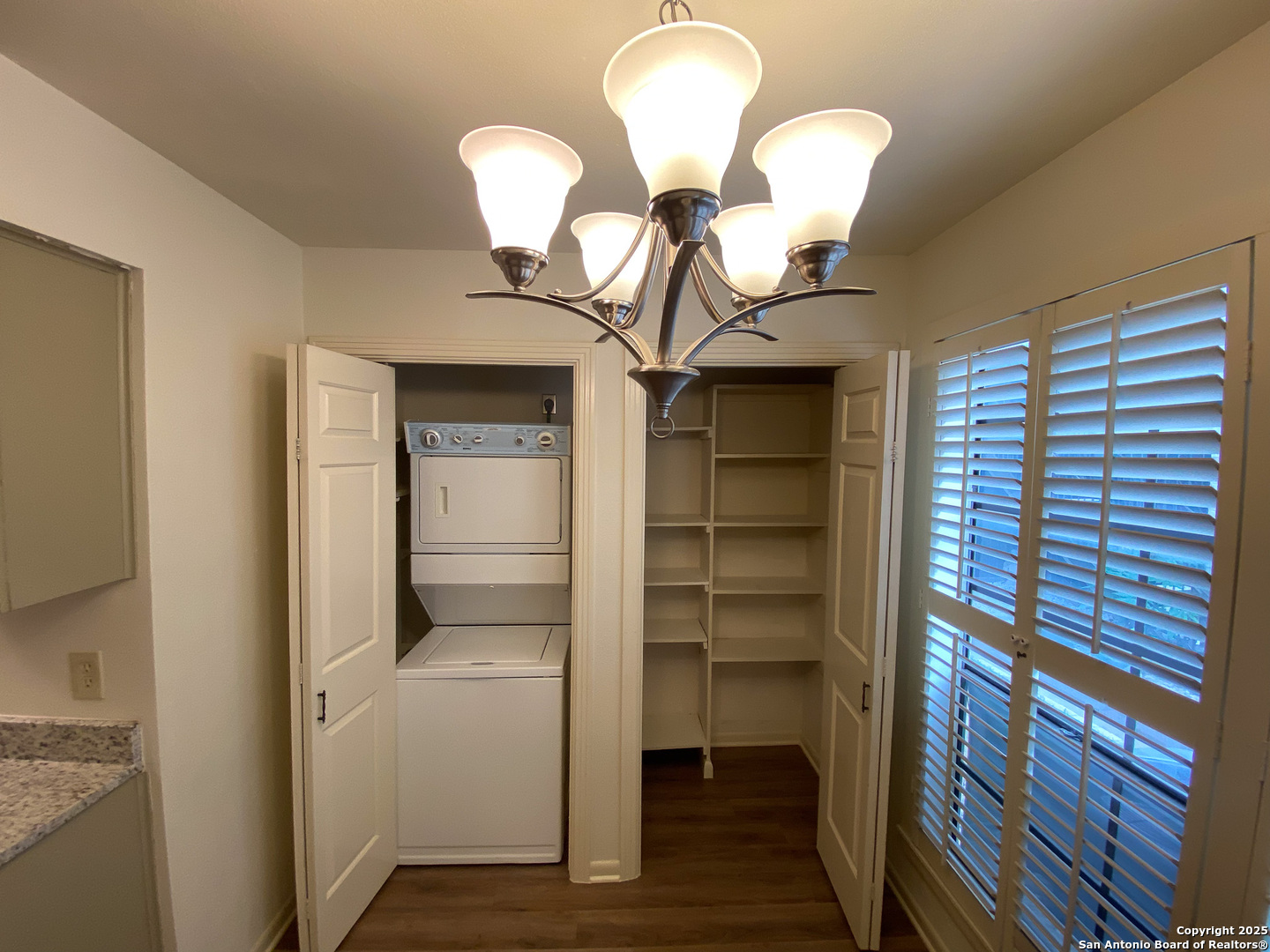 165 West Rampart Drive, Unit 205 San Antonio, TX 78216 - Photo 13 of 34 a view of a livingroom with a staircase