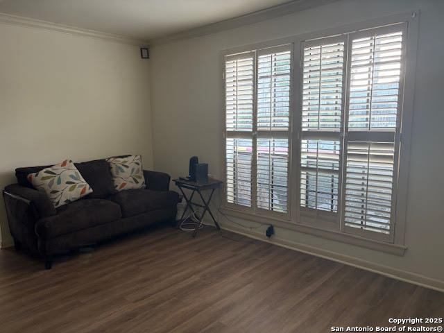 165 West Rampart Drive, Unit 205 San Antonio, TX 78216 - Photo 17 of 34 a living room with furniture and a large window