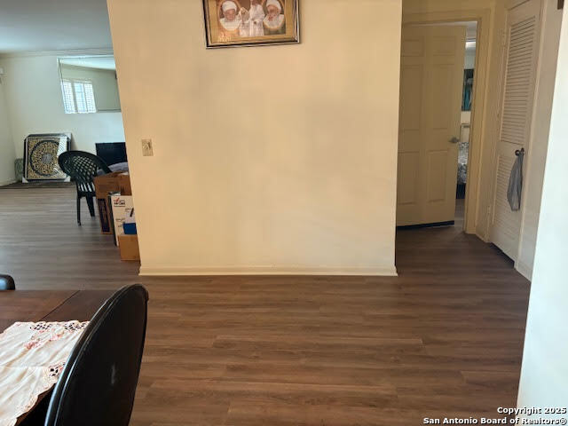 165 West Rampart Drive, Unit 205 San Antonio, TX 78216 - Photo 20 of 34 a view of a livingroom with furniture and wooden floor