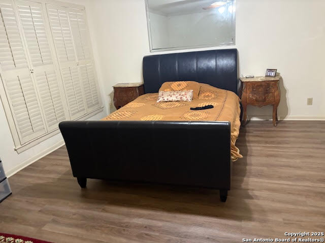 165 West Rampart Drive, Unit 205 San Antonio, TX 78216 - Photo 21 of 34 a room with a table and paintings on wall