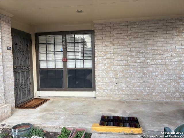 165 West Rampart Drive, Unit 205 San Antonio, TX 78216 - Photo 4 of 34 a view of a entryway in a house