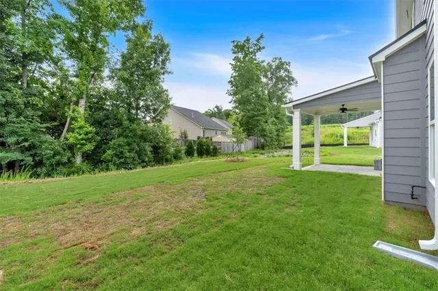 a view of a backyard with a garden