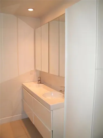 a bathroom with a sink and a vanity