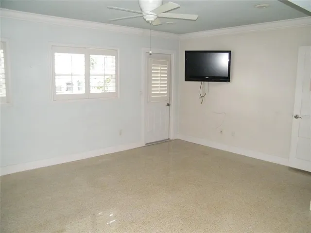 a view of a livingroom with a flat screen tv