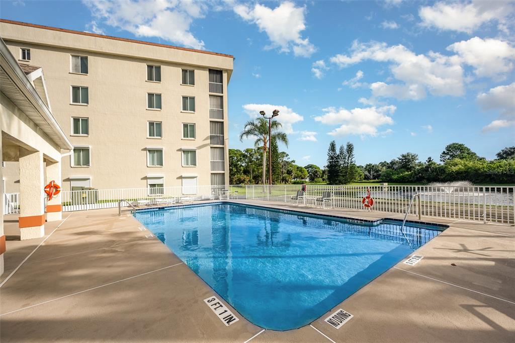 1420 Huntington Lane, Unit 2502 Rockledge, FL 32955 - Photo 21 of 23 a view of swimming pool with outdoor seating and plants