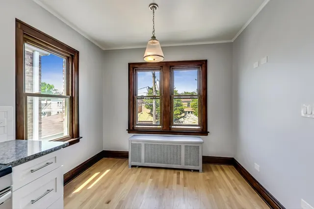 a very nice looking room with windows