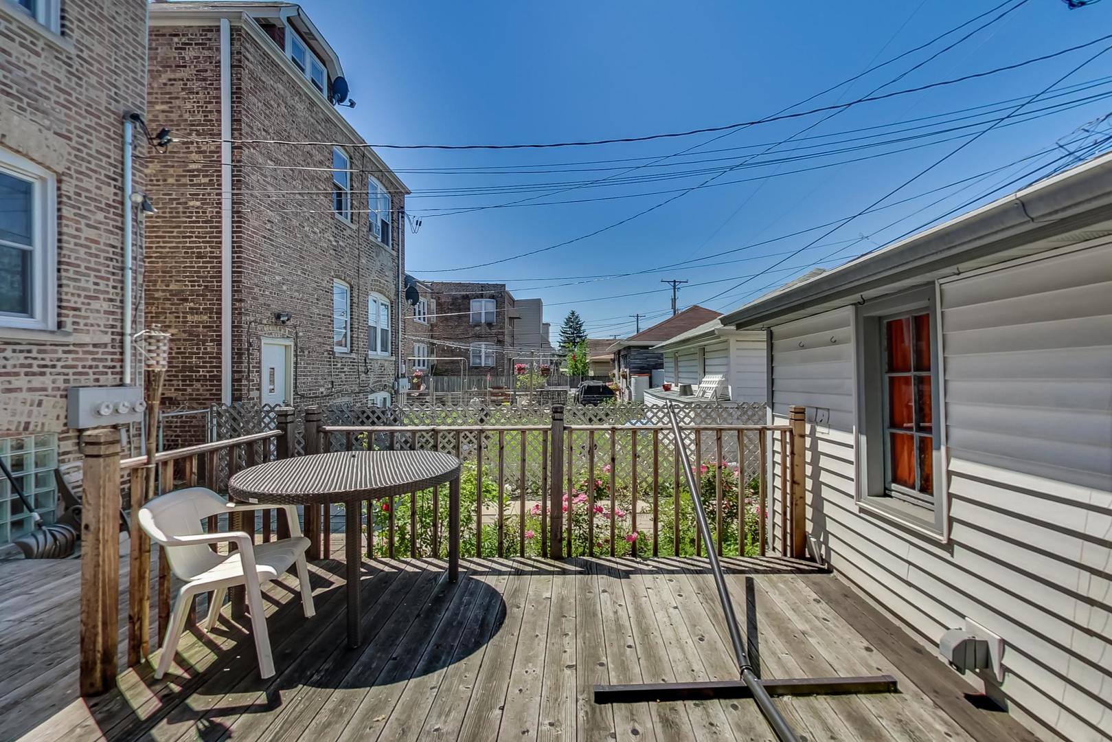 1814 Wesley Avenue, Unit 1 Berwyn, IL 60402 - Photo 26 of 26 a view of a balcony with furniture