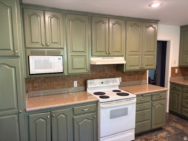 2313 150 East Bountiful, UT 84010 - Photo 10 of 39 Kitchen featuring sage green cabinetry, a built-in microwave, tiled backsplash, granite-finish countertops, and a white electric range with overhead ventilation
