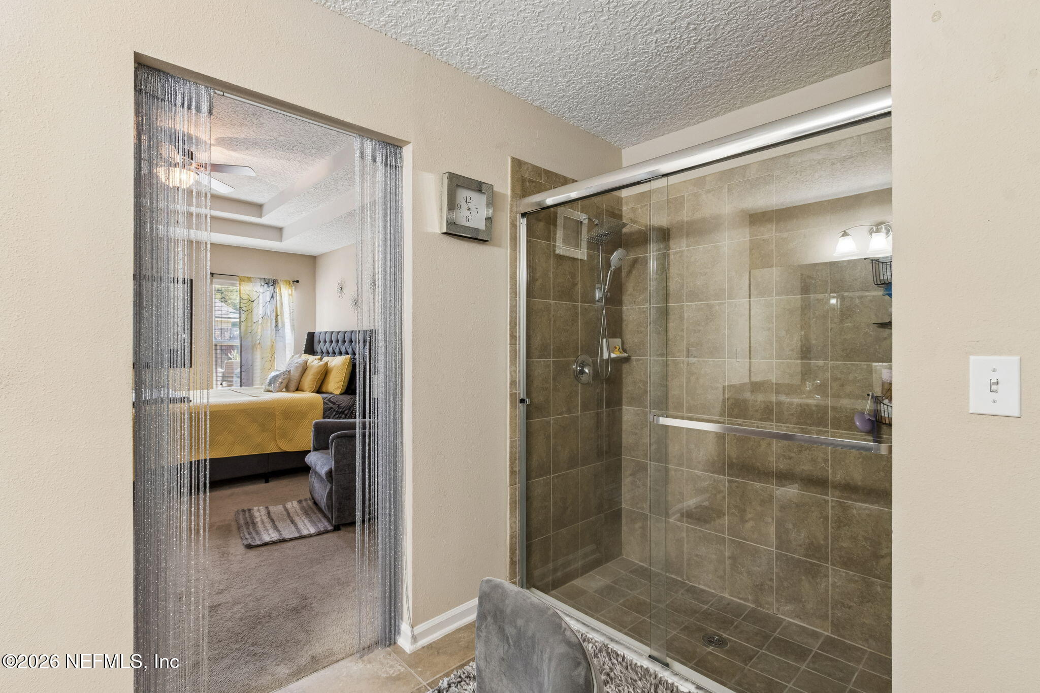 96034 Bass Lane Yulee, FL 32097 - Photo 32 of 50 a en suite bathroom with a shower