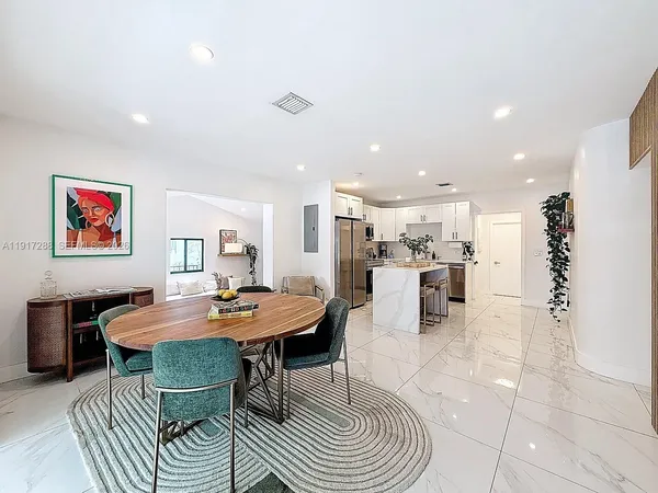 a view of a dining room with furniture