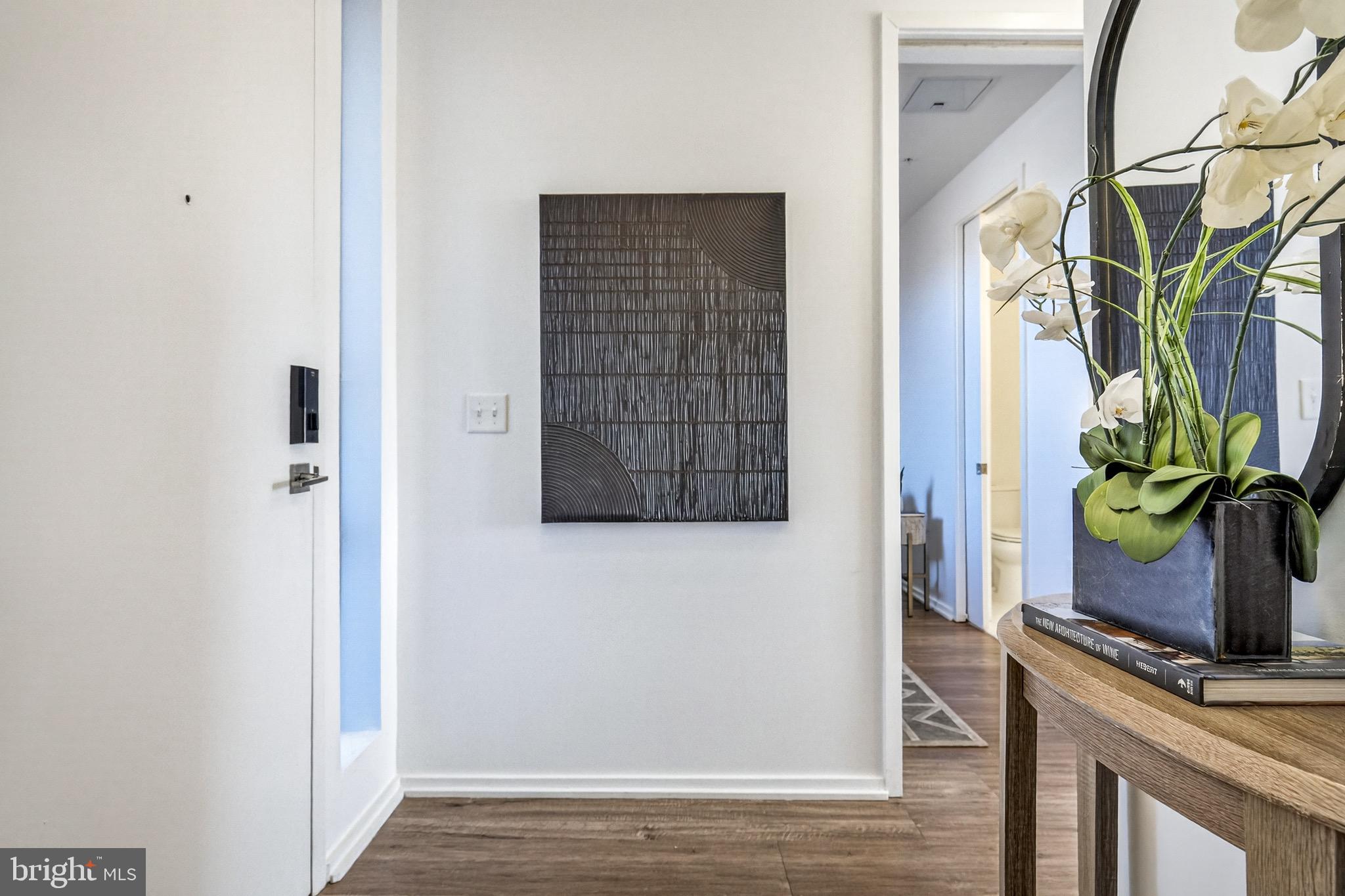 1550 11th Street Northwest, Unit 407 Washington, DC 20005 - Photo 12 of 20 a view of an entryway with wooden floor