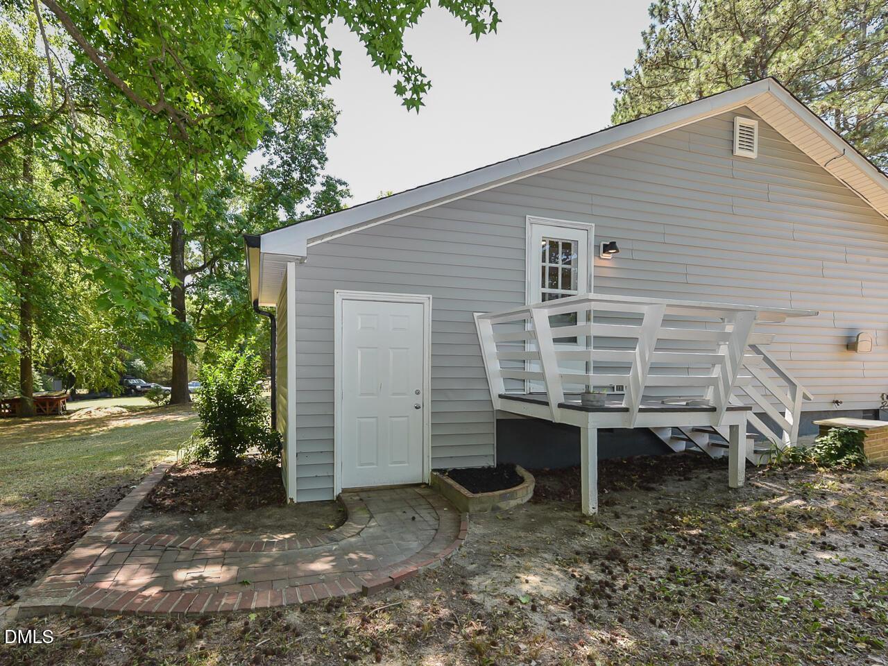 939 Cheves Road Zebulon, NC 27597 - Photo 20 of 21 front view of a house with a yard