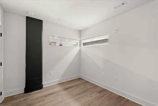 a view of an empty walk in closet