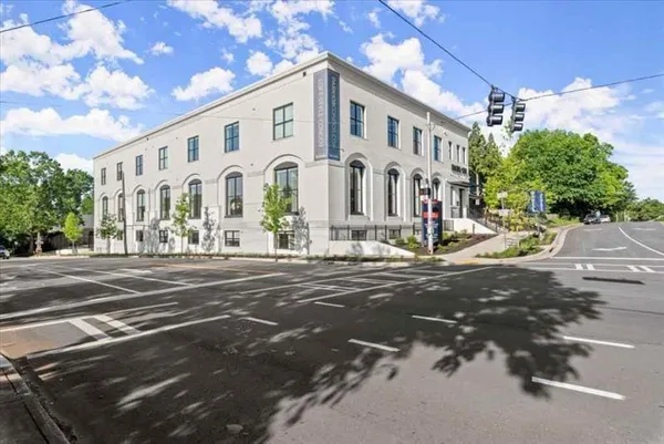 a front view of a building with street view