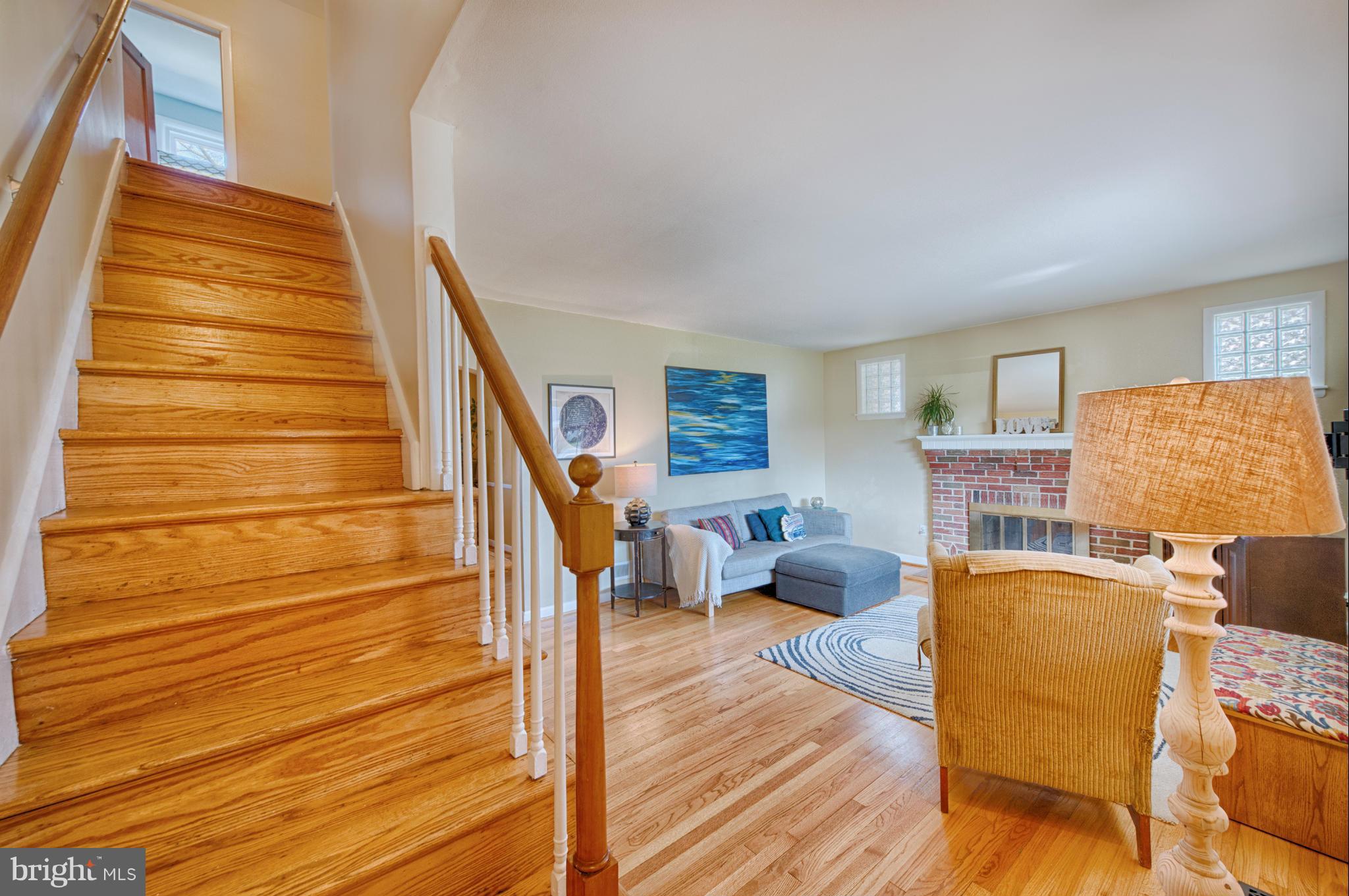 8110 Hillendale Road Baltimore, MD 21234 - Photo 11 of 30 a living room with furniture and a wooden floor