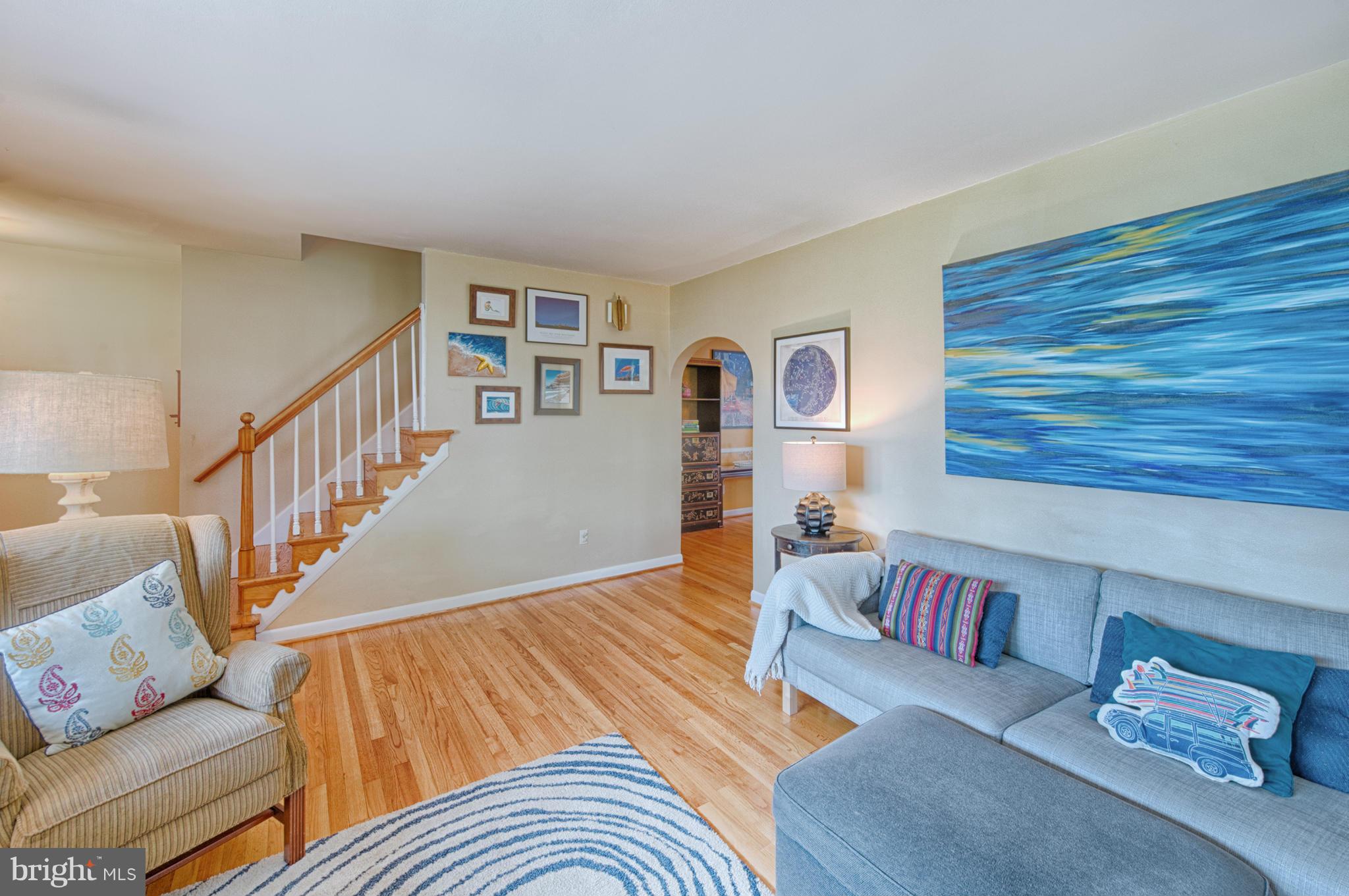 8110 Hillendale Road Baltimore, MD 21234 - Photo 13 of 30 a living room with furniture and stairs