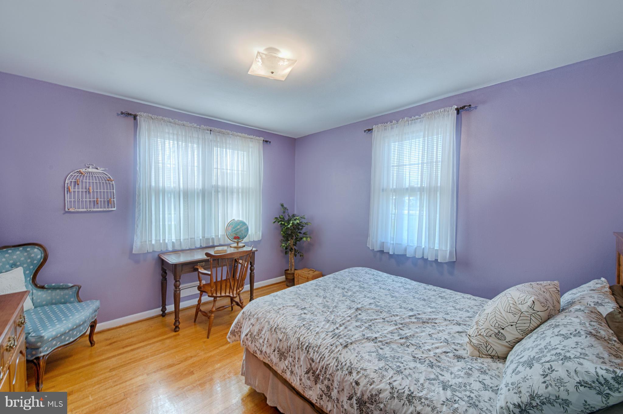 8110 Hillendale Road Baltimore, MD 21234 - Photo 28 of 30 a bed room with a bed and a chair