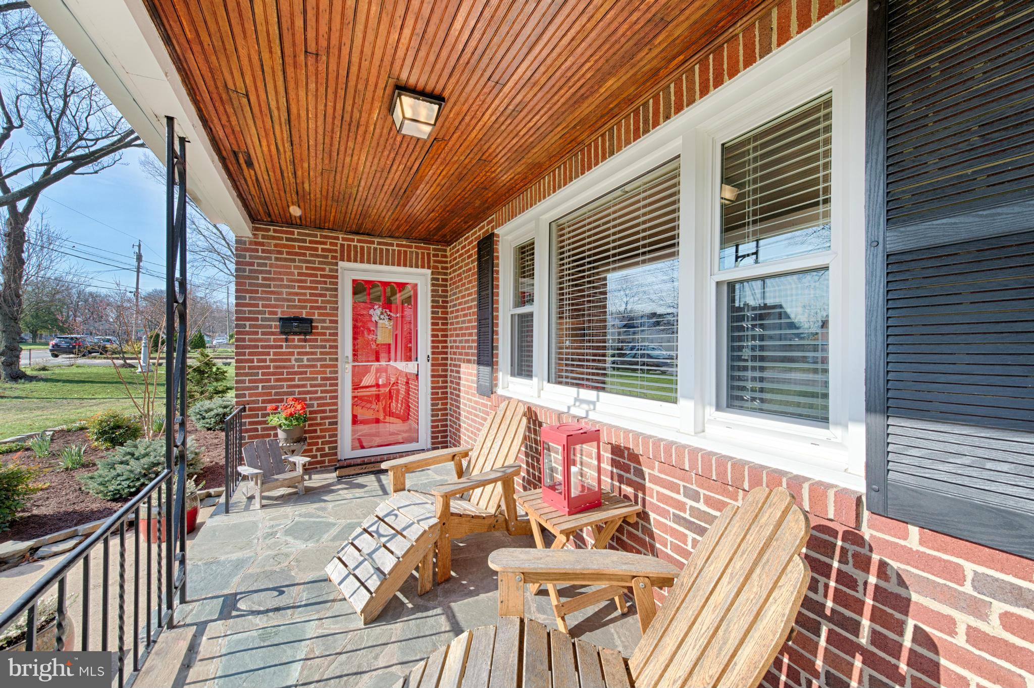 8110 Hillendale Road Baltimore, MD 21234 - Photo 4 of 30 a view of a patio with table and chairs with wooden floor and fence