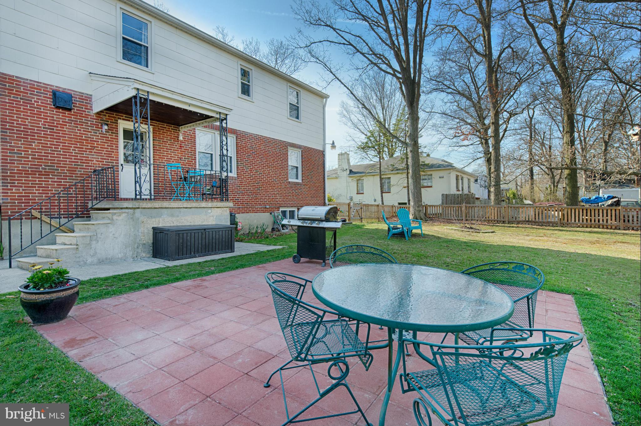 8110 Hillendale Road Baltimore, MD 21234 - Photo 10 of 30 a backyard of a house with table and chairs