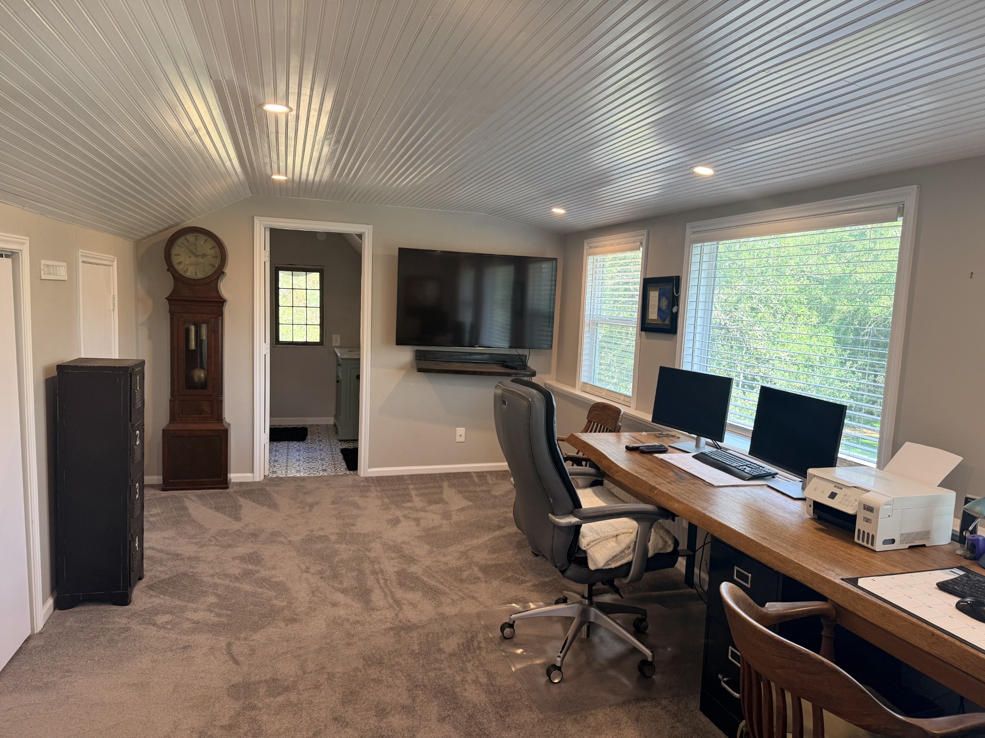 227 Crooked Hollow Road Elgin, TX 78621 - Photo 9 of 11 a view of a workspace with furniture and a window