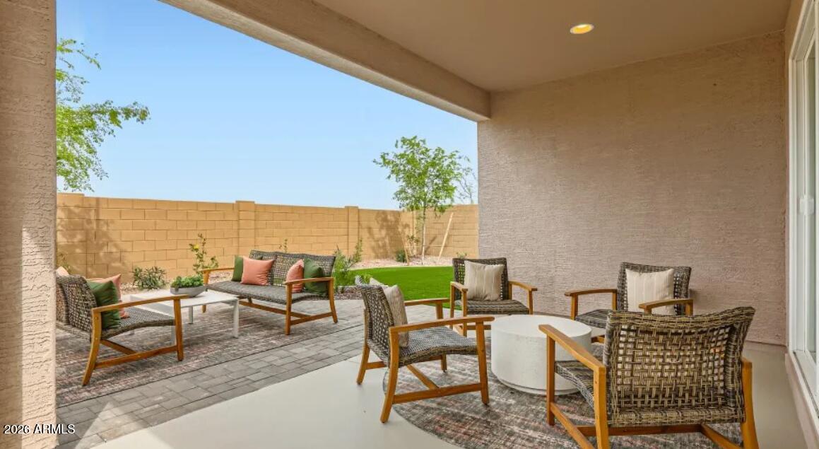 15602 West Miami Street Goodyear, AZ 85338 - Photo 20 of 25 a patio with patio area and furniture