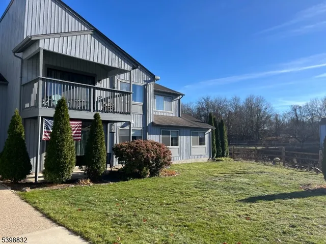 a house view with a garden space