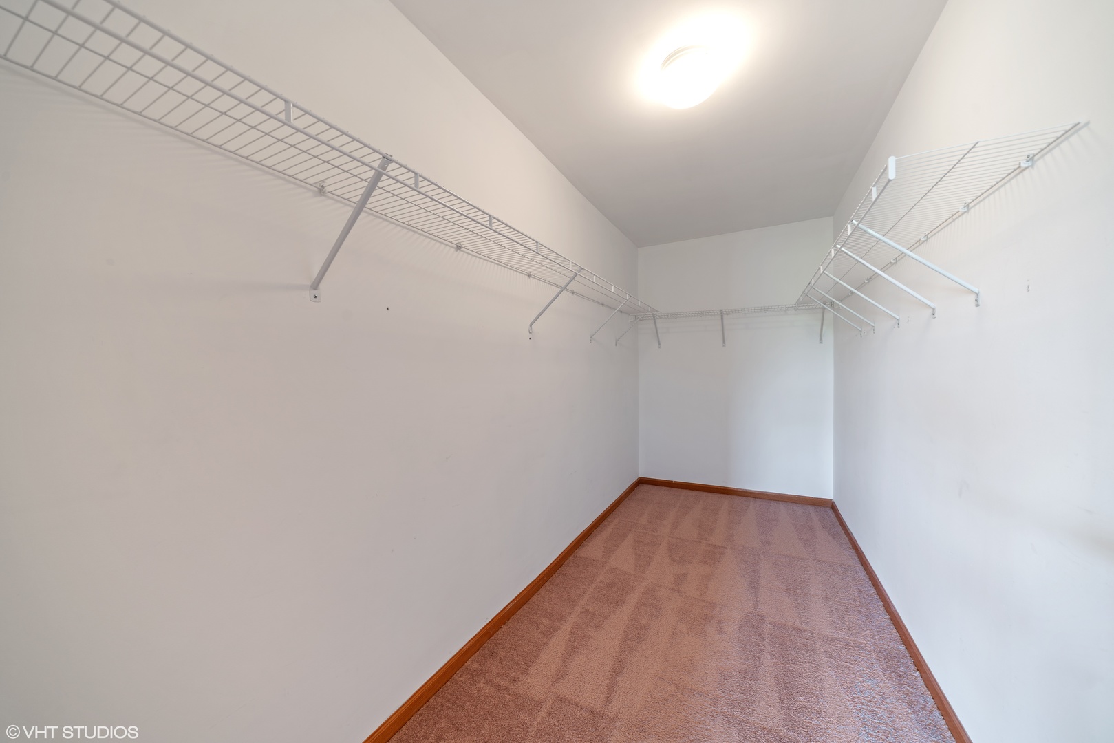 131 Springbrook Trail South Oswego, IL 60543 - Photo 11 of 16 a view of a room with racks on the wall