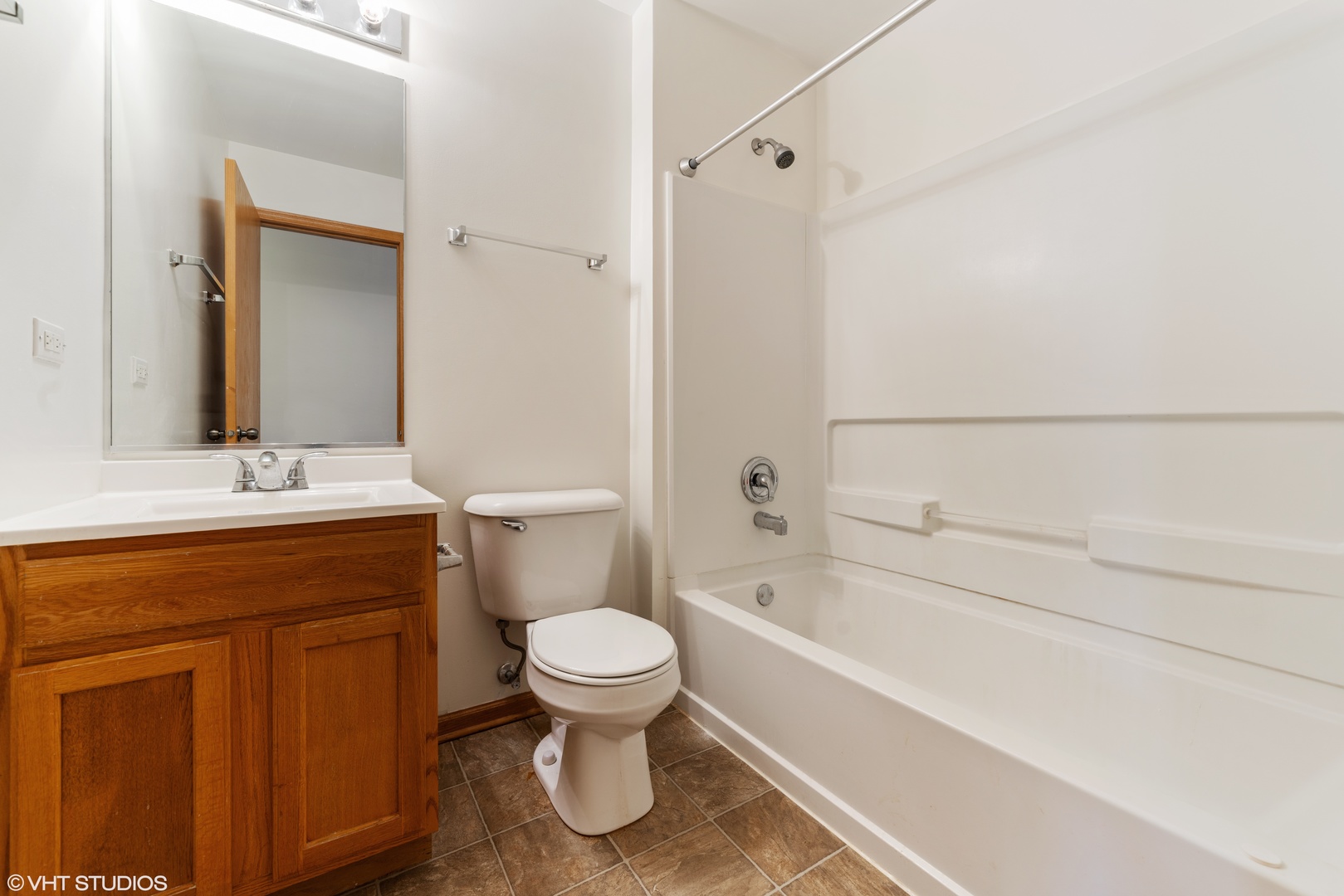 131 Springbrook Trail South Oswego, IL 60543 - Photo 14 of 16 a bathroom with a sink toilet and shower