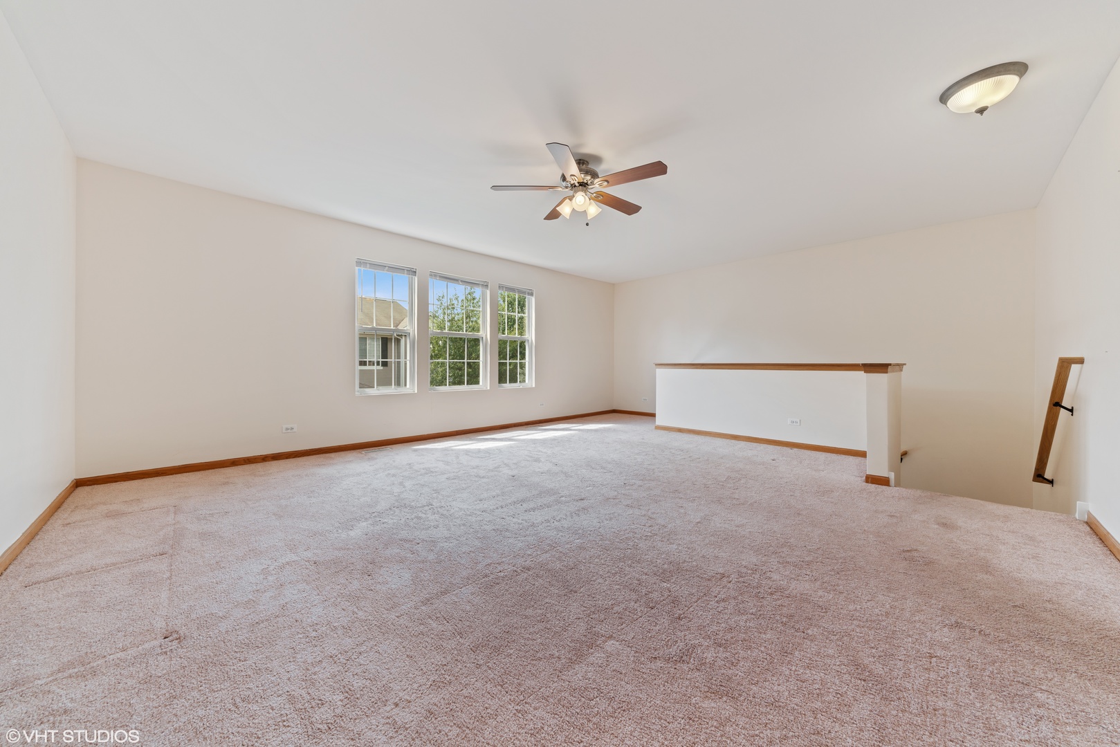 131 Springbrook Trail South Oswego, IL 60543 - Photo 8 of 16 a view of an empty room with a window