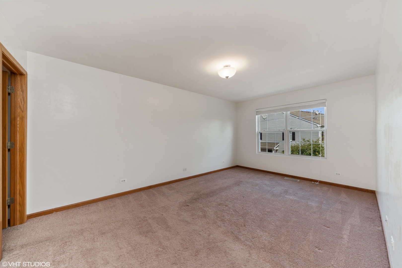 131 Springbrook Trail South Oswego, IL 60543 - Photo 9 of 16 an empty room with a workbench